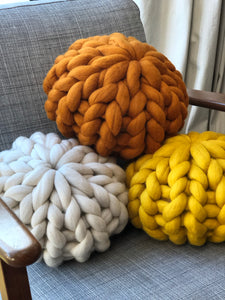 Round chunky knit merino cushion