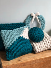 Round chunky knit merino cushion