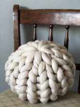 Round chunky knit merino cushion