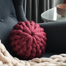 Round chunky knit merino cushion