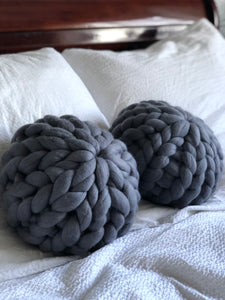 Round chunky knit merino cushion